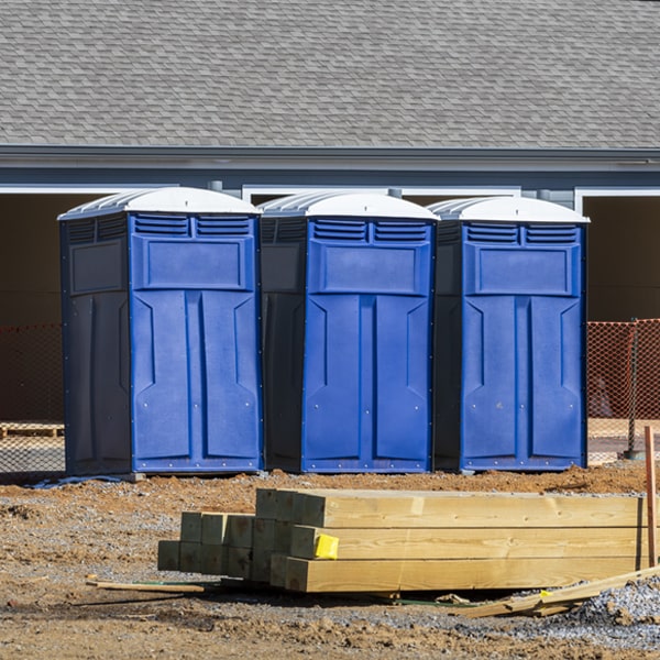 what is the cost difference between standard and deluxe porta potty rentals in Marcellus